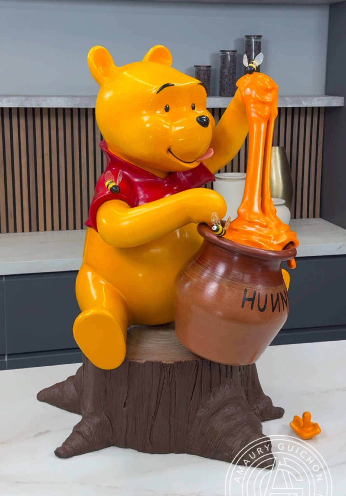 A post by @amauryguichon on TikTok caption: Chocolate Honey Bear! 🍯🐝 The sweetest little companion!  #amauryguichon #chocolate #honey 