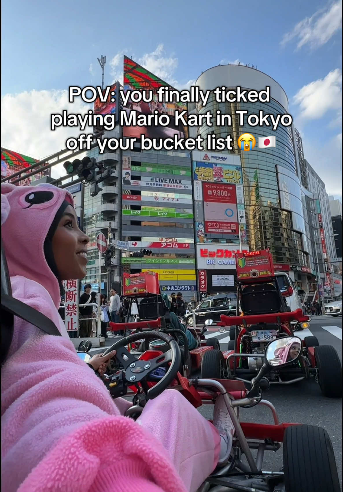 A post by @iconiccpinkk on TikTok caption: One off the bucket list ☑️ #tokyo #mariokart #gokarting #japan 