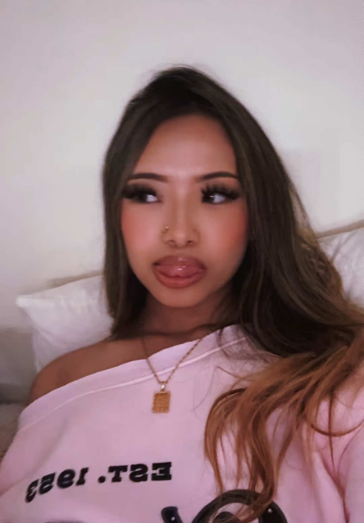 A post by @tianaaaeel on TikTok caption: pink on me? 🤭  #viral #asian #hmong #trendingsound #trending #fyp 