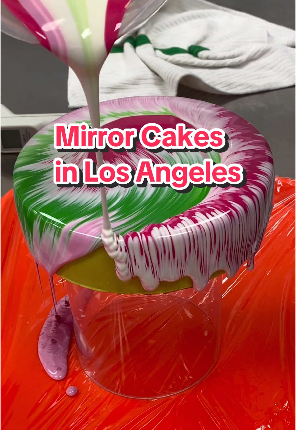 A post by @losangeles_eats on TikTok caption: 📍Cool Bites Patisserie - 932 N Brand Blvd, Glendale, CA 91202. 🍰 They have French pastries like Eclairs, Saint Honorés, Merveilleux, Paris-Brest and more, with high quality ingredients imported from France. 🍫 Each Mirror Cake is unique and cannot be recreated, and the colors used are high quality vegan and non-gmo