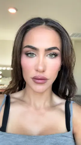 A post by @lifewithadrienne on TikTok caption: My signature eye look. I Should stick to voice overs . Hope this helps #eyelidlift #makeup #hudabeauty #charlottetilbury #makeuphacks #makeuproutine 