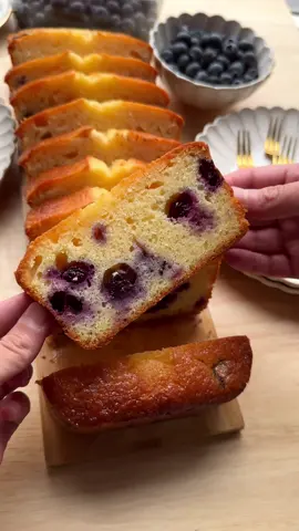 A post by @kookmutsjes on TikTok caption: BLUEBERRY LEMON CAKE #food #recipe #blueberry #lemon #tasty #cake #fy #fyp #foryoupage CAKE BATTER 5 eggs (medium) 260 g granulated sugar 8 g vanilla sugar (1 packet) 150 g unsalted butter 100 ml sunflower oil 175 g yogurt 50 ml lemon juice (from 1 lemon) 8 g lemon zest (from 1 lemon) 350 g flour (all-purpose) 10 g baking powder 250 g blueberries EXTRA 35 g unsalted butter (for topping) Instructions: Melt the butter (150 g) in a saucepan over low heat or briefly in the microwave. Let it cool. Grate the yellow part of the lemon peel (only the yellow part) and squeeze out the juice. Crack the eggs into a large mixing bowl. Add the granulated sugar and vanilla sugar. Mix for 5–7 minutes until the mixture becomes light and fluffy. Add the melted butter and sunflower oil. Mix for 1 minute. Add the yogurt, lemon juice, and lemon zest.  Mix well. Sift the flour and baking powder into the bowl and mix until smooth. Gently fold in half of the blueberries. Pour half of the batter into a cake tin lined with baking paper and smooth it out. Spread the remaining blueberries over the batter. Spoon the rest of the batter on top and smooth it out again. Cut the extra butter (35 g) into slices and place them on top of the batter. This creates an extra moist top layer during baking. Place the cake in a preheated oven at 165 °C (330 °F). Bake for 25–35 minutes. Keep a close eye on it—every oven is different. Check if the cake is done by inserting a skewer: if it comes out dry, the cake is ready. Let the cake cool completely before slicing.