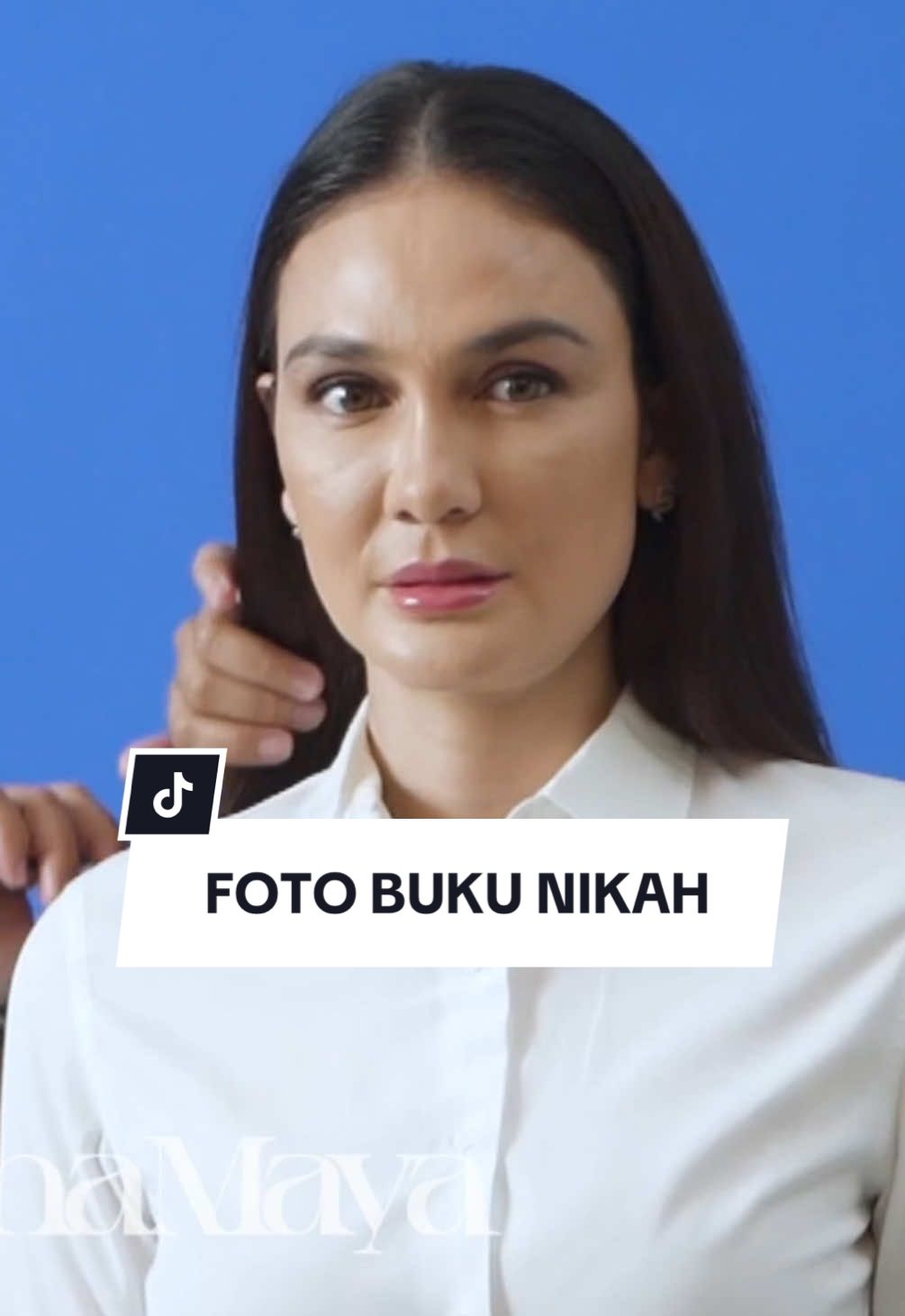 A post by @lunamaya on TikTok caption: Foto buku nikah! 😇📸 stay tune vlog nya di Youtube aku💗 #MOONtotheMAX 