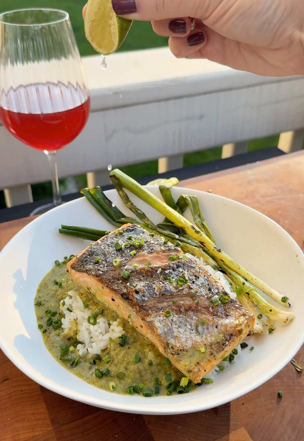 A post by @kristenfaith_eats on TikTok caption: Ramp Salmon and Coconut Rice 🍚🐟 #ramps #rampseason #wildleeks #salmon #salmonrecipe #springrecipe #seafoodrecipe #yum #fyp 