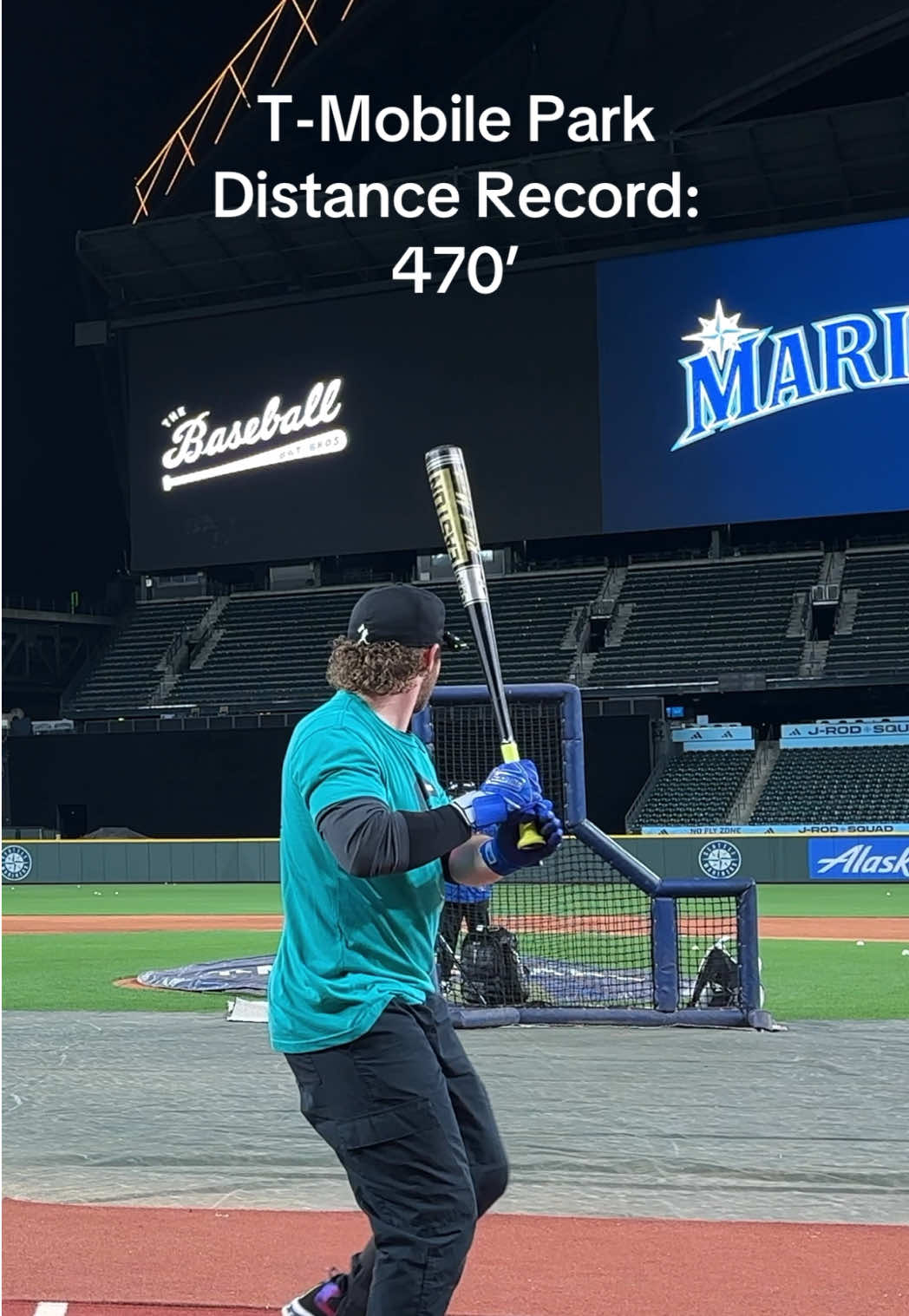A post by @baseballbatbros on TikTok caption: Trying to break the @Seattle Mariners distance record with the BLACK MAGIC.  #baseball #baseballtiktoks 