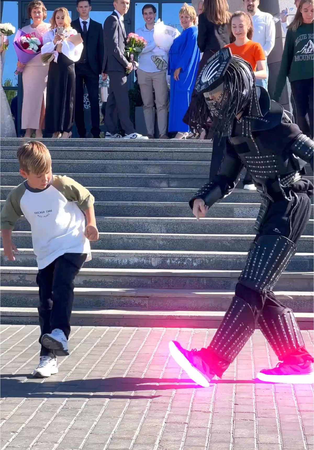 A post by @tuzelitydance on TikTok caption: LITTLE BOY 🤯 AMAZING SHUFFLE !! 😨🔥 NEON DANCE ⭐️