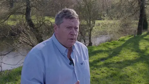 A post by @agriland.ie on TikTok caption: #inCaseYouMissedIt Earlier this month, as part of the River Blackwater Catchment Series, we spoke to Dairygold milk supplier, Kevin Twomey. Kevin is milking 480 cows in Ballyhooley, Co. Cork alongside the River Blackwater valley, on 450 acres of land. #collab