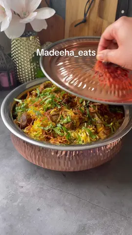 A post by @madeehasfoododyssey on TikTok caption: HYDERABAD DUM BIRYANI - EID UL ADHA SPECIAL   Full recipe on my YT channel  #biryani #mutton #eiduladha #punjabi #foodtok #fyp 