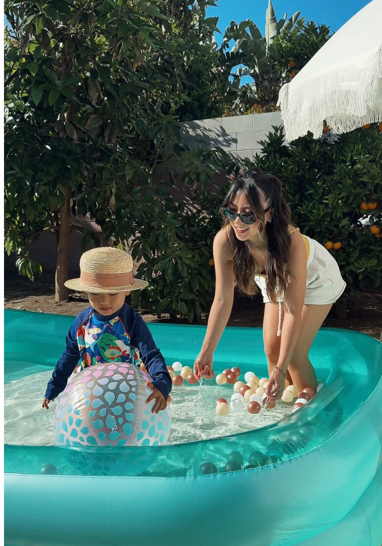 A post by @lovemicorazon on TikTok caption: Mom: coordination. Dad: cannonballs. Who had more fun? 😎 @OfficialFunsicle #ad #WhereFunFloats #waterplay 
