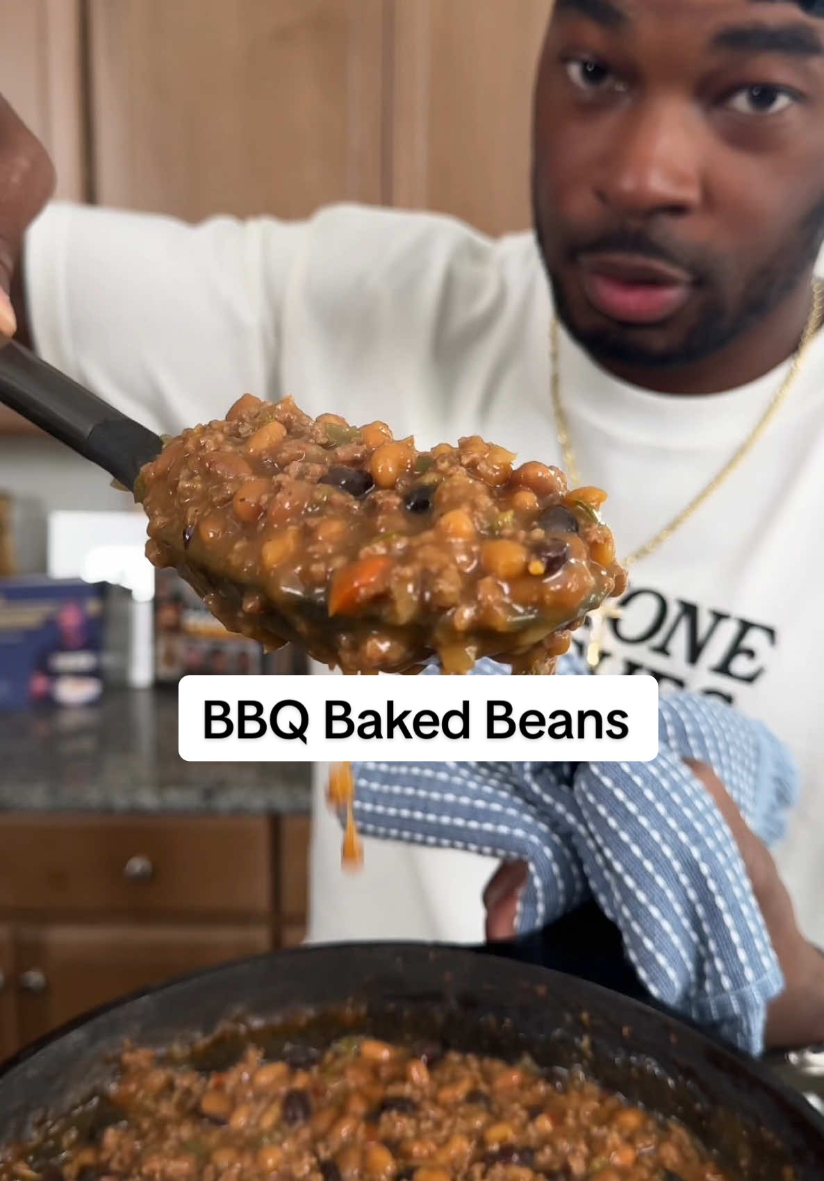 A post by @onestopchop on TikTok caption: Yes, I said three days!!! The back shoulda shrunk by now 😂 FULL RECIPE BELOW BBQ Baked Beans Recipe  Ingredients: *   2 (28 ounce) cans Busch’s Original Baked Beans *   1 (25 ounce) can Busch’s Bourbon and Brown Sugar Beans *   1 (15 ounce) can black beans, rinsed and drained *   1 green bell pepper, diced *   1 red bell pepper, diced *   1 yellow onion, diced *   2 jalapeños, seeded and minced (adjust to your spice preference) *   1/4 cup yellow mustard *   1/2 cup dark brown sugar *   1/4 cup Worcestershire sauce *   1/2 cup BBQ sauce (your favorite kind) *   2 tablespoons Nature’s Seasoning *   1 teaspoon smoked paprika *   1/2 teaspoon garlic powder *   1/2 teaspoon onion powder *   1 pound ground beef or turkey *   Salt and pepper to taste Instructions 1.  Preheat your oven to 375°F (190°C). If you’re using a grill, set it up for indirect heat, aiming for a temperature around 375°F (190°C). Cook the Meat: 1.  In a large skillet (if you’re not using a cast iron skillet for the whole cook), brown the ground beef or turkey over medium-high heat. Drain off any excess grease. Combine Ingredients: 1.  In your cast iron skillet, combine the cooked ground meat, Busch’s Original Baked Beans, Busch’s Bourbon and Brown Sugar Beans, black beans, diced green bell pepper, red bell pepper, yellow onion, and minced jalapeños. 2.  Add the mustard, dark brown sugar, Worcestershire sauce, BBQ sauce, Nature’s Seasoning, smoked paprika, garlic powder, and onion powder. Mix everything thoroughly to ensure all ingredients are well combined. 3.  Taste and adjust seasonings as needed. Add salt and pepper to your liking. If you want it sweeter, add a bit more brown sugar or BBQ sauce. For more heat, add a pinch of cayenne pepper. Bake or Grill: *   Oven: Cover the cast iron skillet with a lid or aluminum foil. Bake in the preheated oven for 1 hour. Remove the lid or foil and bake for an additional 30 minutes to allow the top to caramelize. *   Grill: Place the cast iron skillet on the grill, away from direct heat. Cover the grill and cook for 1 hour. Remove the lid and cook for another 30 minutes to get a nice smoky flavor and caramelized top. Let Rest and Serve: 1.  Once the beans are done, remove the skillet from the oven or grill. Let it rest for about 10-15 minutes before serving. This allows the flavors to come together even more. #bakedbeans #bbq #memorialday #onestopchop 