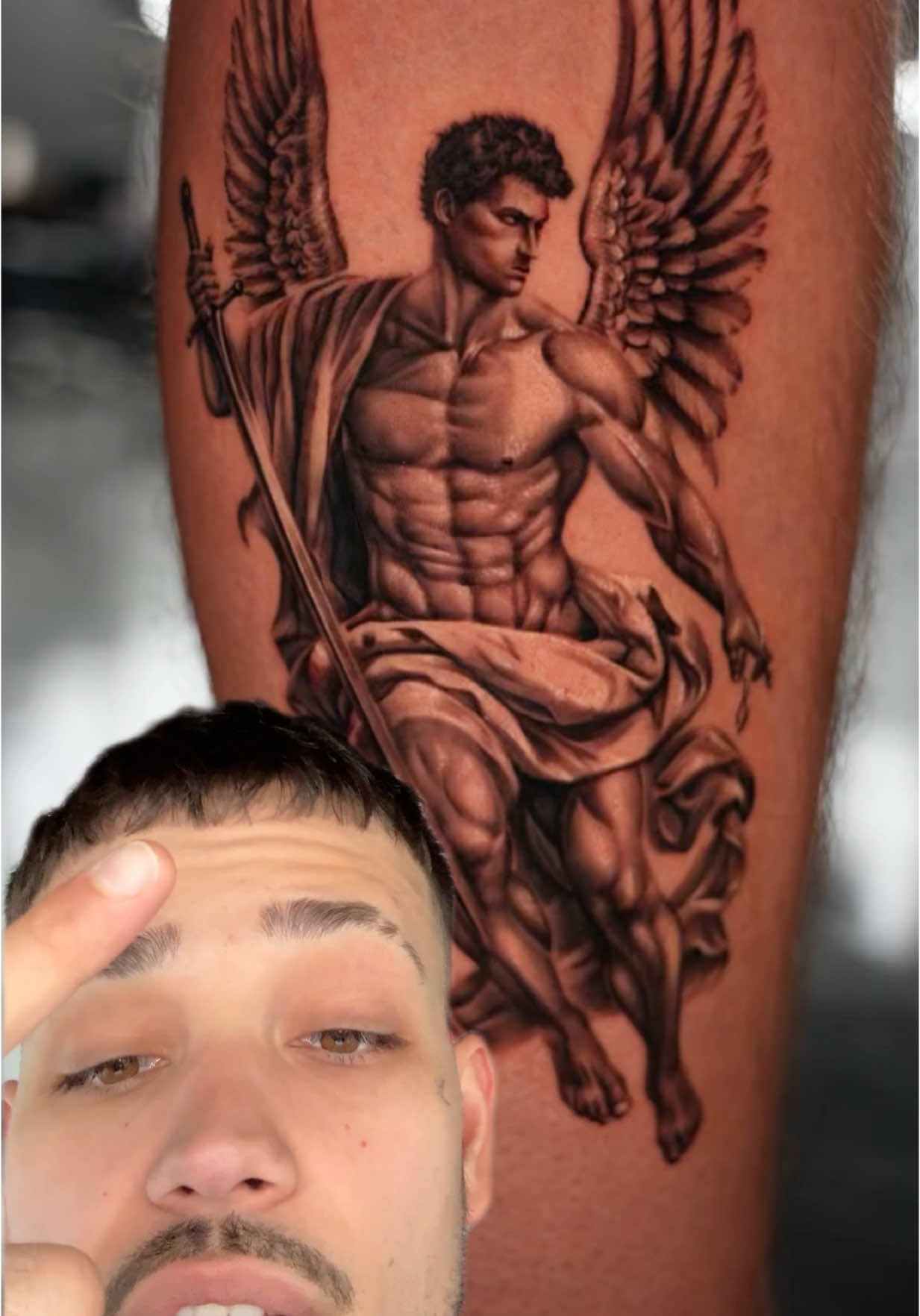 A post by @scm_ink on TikTok caption: Would you get an ai tattoo.. text (845)385-2136 for your next tattoo#fyp #foryoupage #tattooartist #tatted #tattoos #viral #tattooideas #realism #backtattoo 