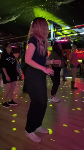 A post by @electriccowboylewisville on TikTok caption: PYT @mari #eclewisville #texas #texascheck #linedancing #linedancersoftiktok #trending #popular #fyp #dfw #dallastx #dancethenightaway #countrybar #dance #hotgir🔥💋 #texasgirl❤️🤍💙 