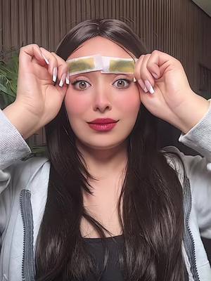 A post by @nouhailaait__ on TikTok caption: Shaving my eyebrows and trying eyebrow sticker tattoo 