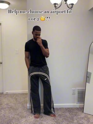 A post by @king_bar7 on TikTok caption: Which outfit should I wear to the airport 🤔🤔? Big shoutout to @Keevado Fashion  that came to the rescue , check them out for all Yeezy X Gap collab clothings and more  , clothes are running out ! outfits link below 🔥🔥 #yeezygap #airportfit 
