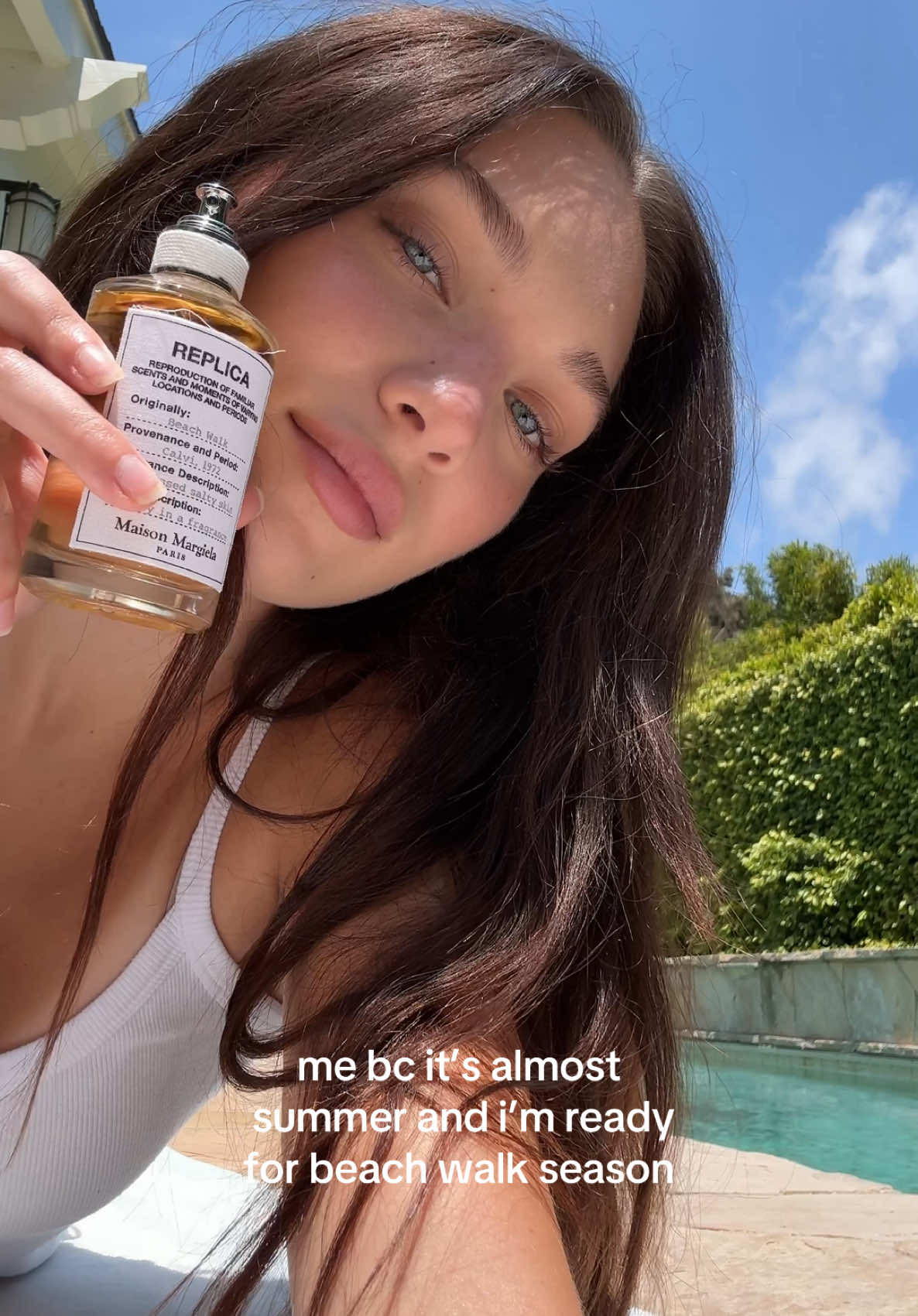 A post by @maddieziegler on TikTok caption: my signature scent for summer will always be the smell of sunscreen and salt in the air : replica beach walk @maisonmargielafragrances 🌊🏝️#maisonmargielafragrances #ad 