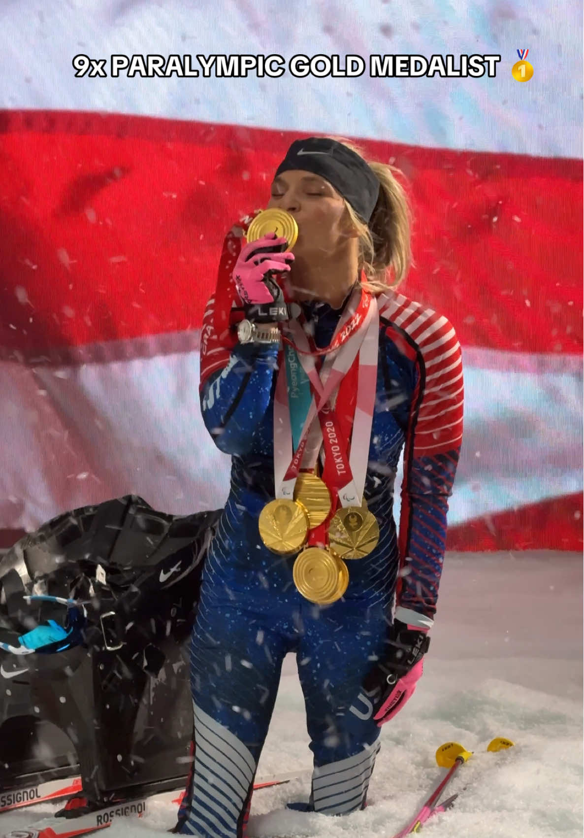 A post by @teamusa on TikTok caption: After @Oksana Masters won two more golds in Paris, new medal photos were a must. 🐐 #winterparalympics #oksanamasters #Paralympics #nordicskiing #ski #goat #gold 