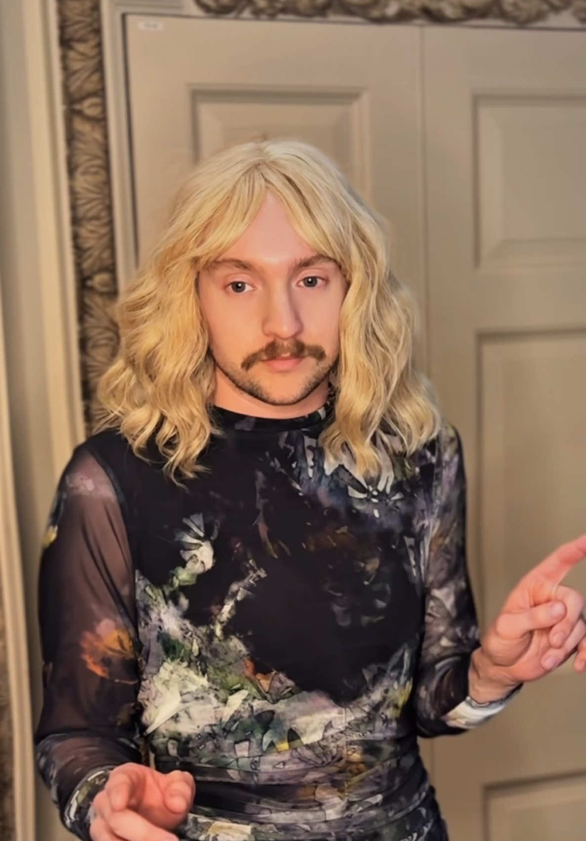 A post by @nicholas_flannery on TikTok caption: That reaction to her wig was REAL #HuluPartner Watch #NinePerfectStrangers now on @hulu with new episodes every week @Nine Perfect Strangers #nicolekidman 