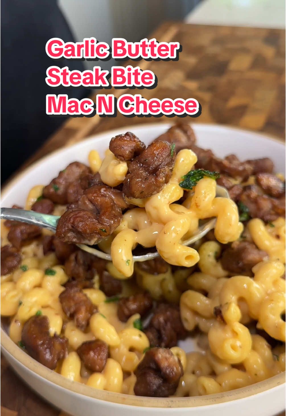 A post by @ice.karimcooks on TikTok caption: Save this ‼️ High Protein Garlic Butter Steak Bites w Mac & Cheese! IT’S Plant Based 🌱😍 (recipe 👇🏽) Ingredients: Avocado oil spray  Impossible® Steak Bites From Plants 🌱  Salt & Pepper, to taste 🧂  Garlic butter, 1 tsp 🧈  Chopped parsley 🌿  6oz dry Cellentani Protein Pasta  American cheese, 3 slices 🧀  1/2 cup pasta water 💦  2 tbsp Mac n cheese powder  For the high protein cheese sauce: 3/4 cup low fat cottage cheese  3/4 cul Fat free Fair life milk 🥛  1/4 cup reduced fat shredded cheddar 🧀  Nutritional yeast, 1 tbsp Onion powder, 1/2 tsp Garlic powder, 1/2 tsp Paprika, 1/2 tsp Blend sauce really well until smooth and creamy! On low heat add 1 tsp garlic butter, the cooked Al dente noodles, the cheese sauce above, American cheese singles, and pasta water then cook for a 4-5 minutes or until creamy and combined!  If too thick, add a little more milk, if too thin, cook a little longer on LOW HEAT!  Enjoy 😍 . . . . #impossiblepartner #icekarim #easyrecipes #mealprep #quickrecipes #impossible @Impossible Foods 