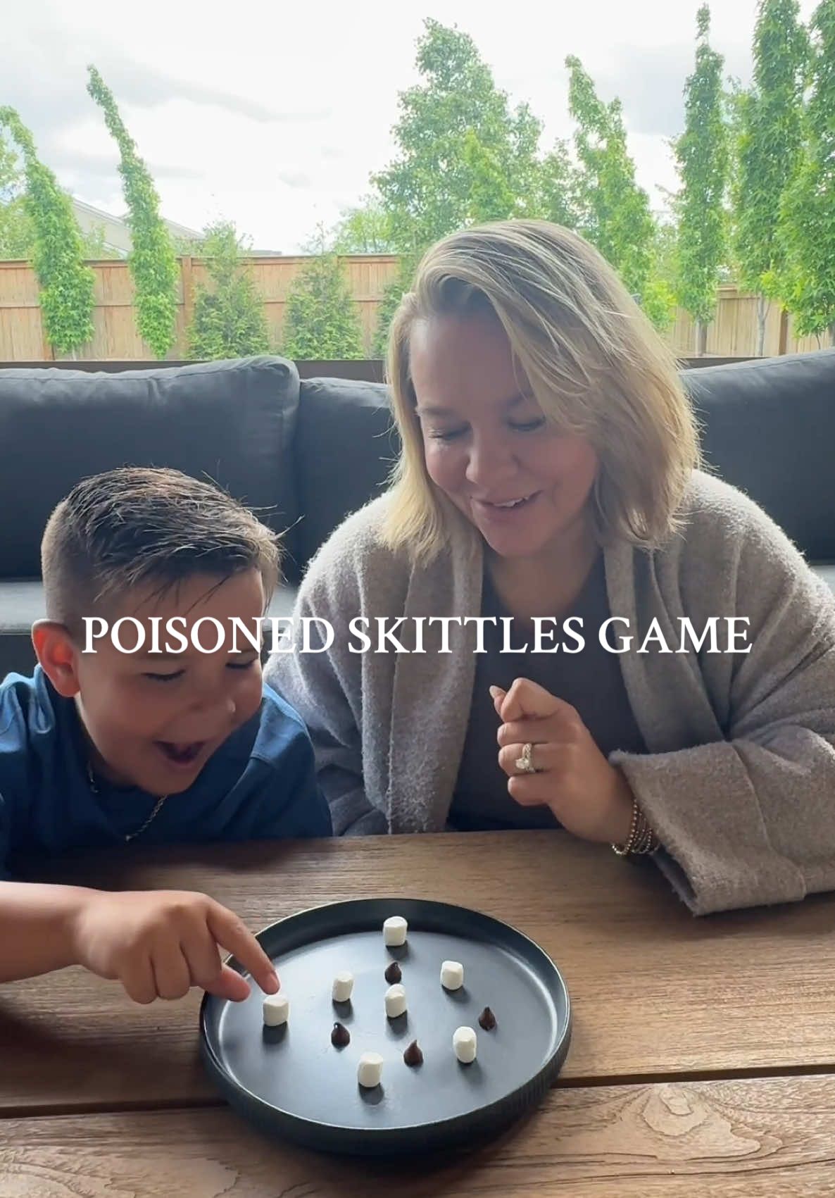 A post by @_catben_ on TikTok caption: poison skittle game 🍫 #MomsOfTiktok #viral #tiktok #trend #skittles #games #fyp