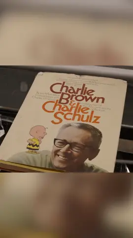 A post by @pawnstars on TikTok caption: Is this Charlie Brown book signature legit? #PawnStars 