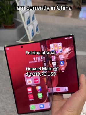 A post by @salabonce on TikTok caption: I am in Shenzhen China and Macao to try this folding phone! I’ve never seen a Huawei phone I am amazed #foryou #fyp #4u 