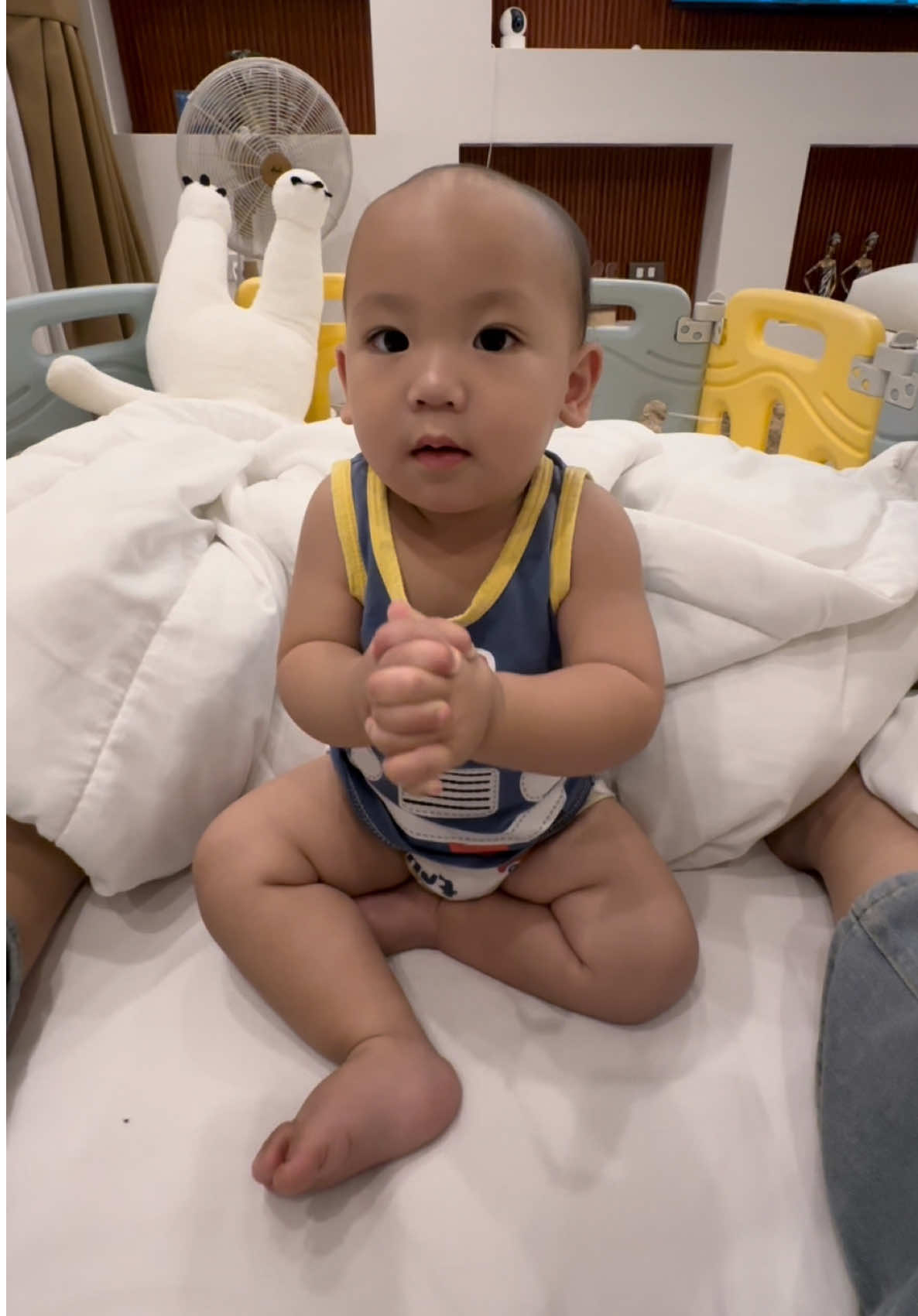 A post by @carlyncabel on TikTok caption: Nonchalant baby 😅
