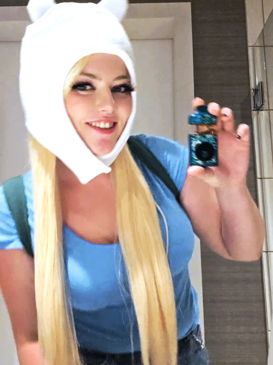 A post by @ on TikTok caption: he is just like me for real #adventuretime #adventuretimecosplay #finncosplay #momocon #lipsync #cosplayer #jakethedog 