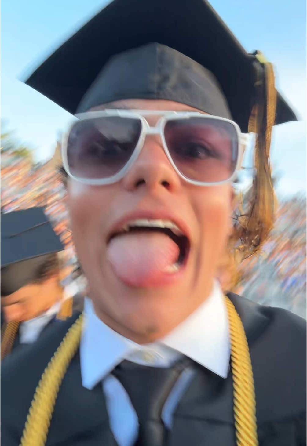 A post by @themalachibarton on TikTok caption: THATS A WRAP!! #fyp #graduation 