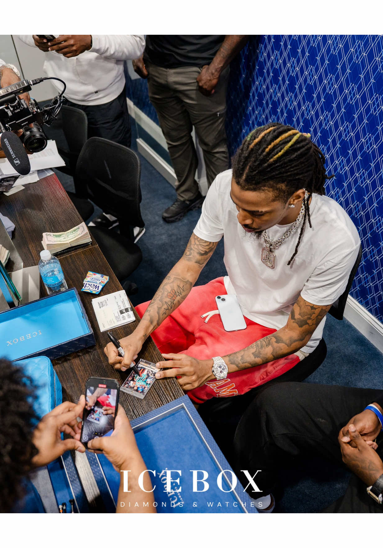 A post by @icebox on TikTok caption: Ja Morant autographs his rookie card @icebox 🏀💎✅ Watch our latest YouTube episode that just dropped! 📸