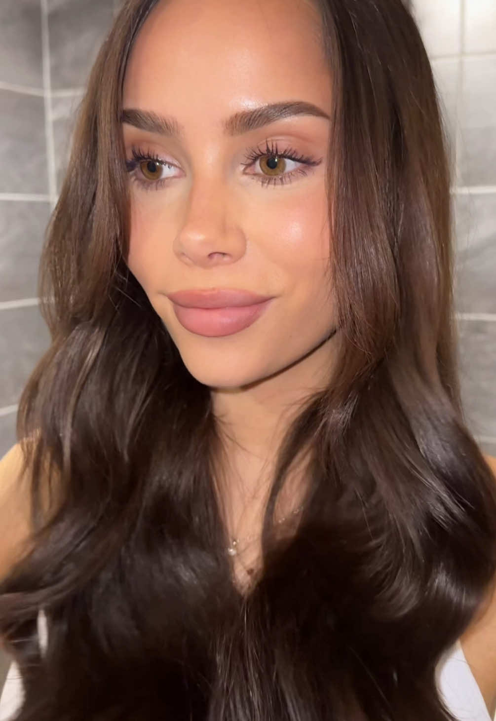 A post by @jennatanisha on TikTok caption: Advertisement for L’Oreal My viral beauty routine using all my favorite drugstore products 🌻💛 @L’Oréal Paris Revitalift Hyaluronic Acid Eye Serum #garniernordics Vitamin C Daily UV Glow SPF50+ @Maybelline NY Lumi Matte Foundation Maybelline Instant Eraser Concealer  @NYXCosmeticsNordics Buttermelt Bronzer & Blush - 01 & 05 Maybelline Sky High - Plum Twilight Maybelline Superstay Teddy Tint - 20 Loreal Brow Lamination Loreal Glycolic Gloss Hair Serum @essie Cuticle Oil #SkinCare #nailcare #haircare 
