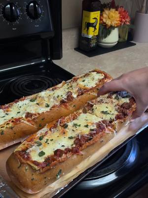 A post by @vanessacooks_ on TikTok caption: Lasagna bread boats #lasagna #bread #recipe #fyp #dinner 