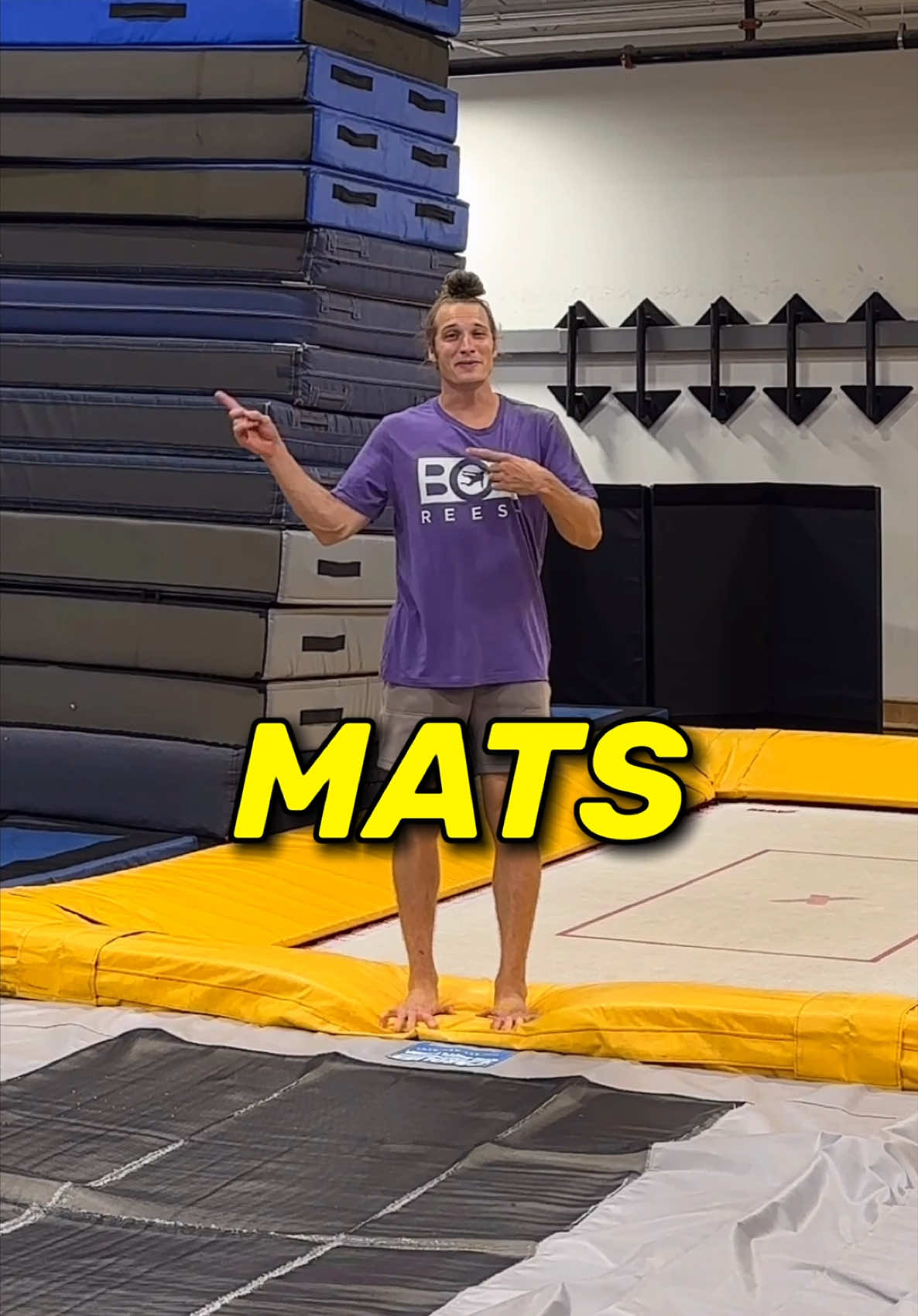 A post by @bob.reese on TikTok caption: How Many Mats Can I Back Flip Onto? 😱 Location: @Motive Movement 