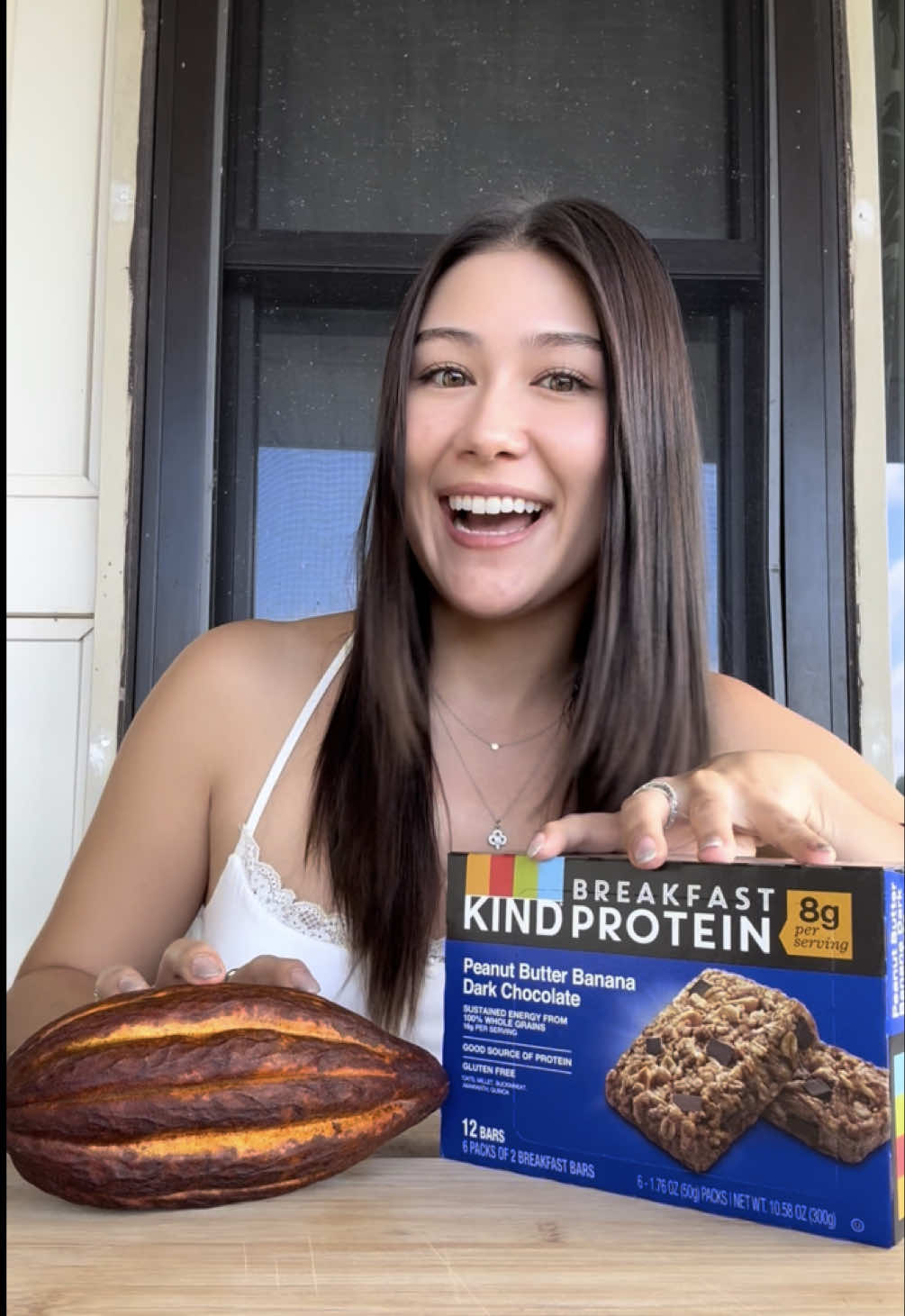 A post by @pepperonimuffin on TikTok caption: It’s giving, I need chocolate before noon KIND of day #KINDpartner @KIND Snacks 