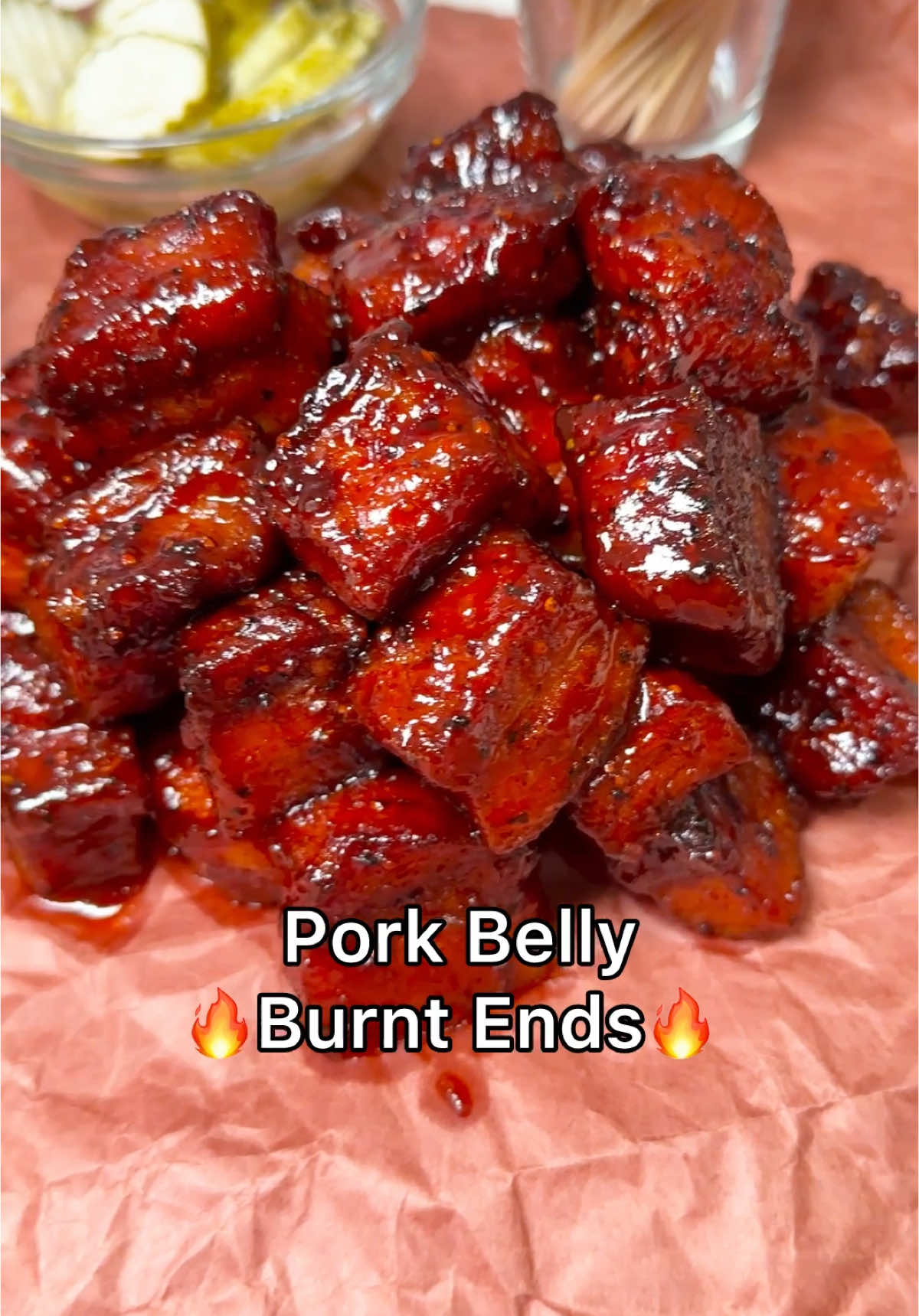 A post by @chefgenevieve on TikTok caption: 🔥Pork Belly Burnt Ends🔥 #bbq #burntends #porkbelly  Ingredients: 5 lb slab of skinless porkbelly 3 tablespoons of BBQ rub 1/4 cup of light brown sugar  1/4 cup of honey  1 cup of BBQ Sauce Slice pork belly into strips then into cubes (about 1.5 inches thick) Generously season with your favorite bbq rub and toss to evenly coat. Place on a rack, fat side down over a foiled lined sheet pan then smoke in 250°F for 3.5 hours or until the internal registers at 190°F (if you don’t have a smoker, you can use your oven) Transfer to a disposable steamer pan, add bbq sauce, sprinkle on brown sugar and drizzle on some honey.  Toss again then return to smoker or oven  uncovered set at 225°F for an additional hour to allow the sauce to set (or until the internal registers at 204°F) Enjoy!