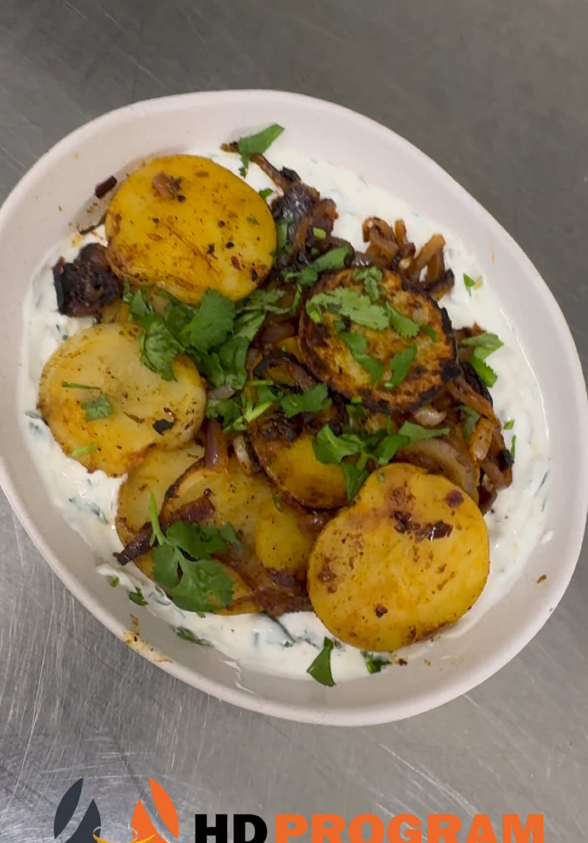 A post by @hdmeal on TikTok caption: Try this Rosted Potato Salad n thanks me later . It will give you only 280 calories and 30 G Protein 💪💪.  #hdprogram #hdmeal #desidiet #punjabi @HD Program | +61411229631 
