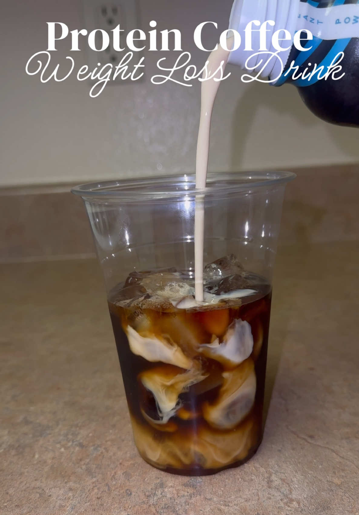 A post by @mishlovee on TikTok caption: Protein Coffee for Weight Loss ❤️ Find more recipes in My Weight Loss CookBook 📚 Www.bodybymish.com #weightlossjourney #weightlosstransformation #weightlossinspiration #weightloss #weightlosstips #reels  #workoutmotivation #workoutRoutine #gettingfit #BeginnerWorkOut #youtube #recipes #weightlossrecipes #WeightLossJourney #HealthyRecipes #ProteinAndFiber #SustainableEating #HealthyLiving #CookbookRelease #LoseWeight