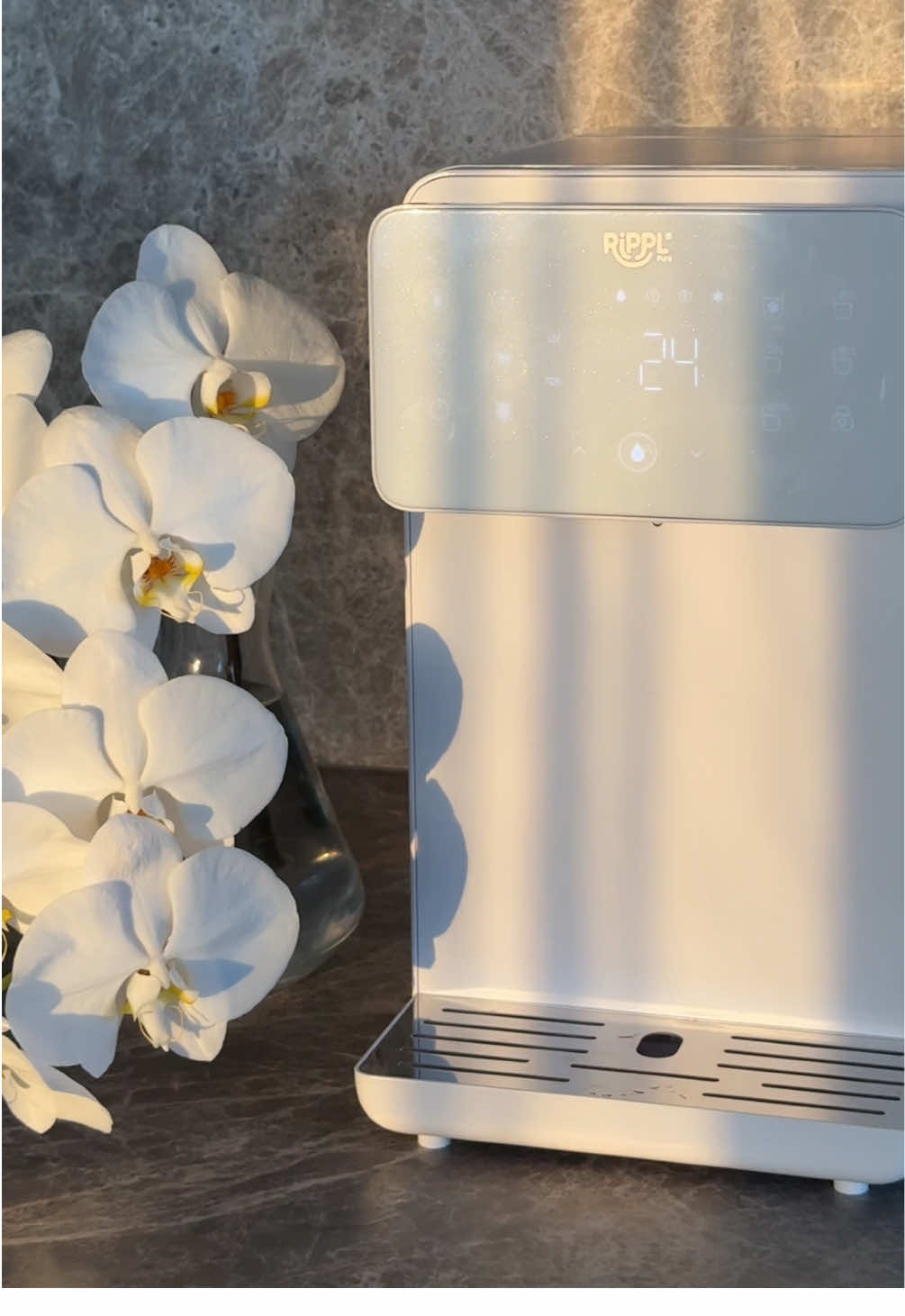A post by @alissagriffiths on TikTok caption: @Rippl reverse osmosis water purifier 🫶 Instantly hot & cold, filtered water you don’t need to plumb in x #rippl #ripplwater #drinkrippl #waterfilter #water #reverseosmosis #filtered #filteredwater 