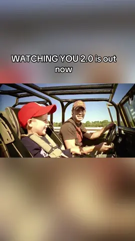 A post by @rodneyatkinsmusic on TikTok caption: This one’s for every dad, every kid who grew up on this song, and everyone who’s ever been watched by someone they love. Let’s take Watching You 2.0 to #1 today. #WatchingYou2 #FatherSon #CountryMusic #CountryTok #RodneyAtkins #EliAtkins  #countrymusic 