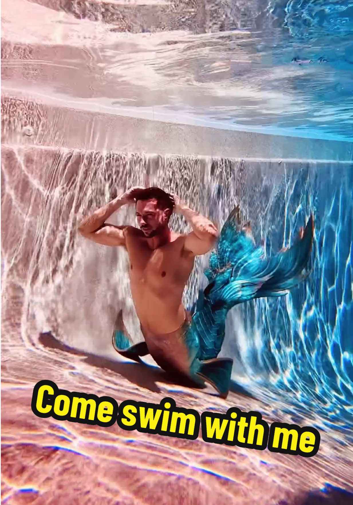 A post by @mermanthommy on TikTok caption: ☀️ Golden hour, sparkling water, and Summer Solstice dreams 🌊 ✨  There's something about slipping into the water that feels like coming home-especially in my @finfolkproductions tail, Solstice. Every flick of the fin, every scale that shimmers in the sun... it's pure summertime magic. 💫  Whether you're a fellow mer, a daydreamer, or just soaking up the vibes-this space is for you.  New here? Dive in and hit that follow for more mermaid moments, behind-the-scenes magic, and ocean-hearted adventures. 💚💛 Already part of the pod? Drop a 🐚 or let me know your favorite place to swim in the comments!@Finfolk Productions 