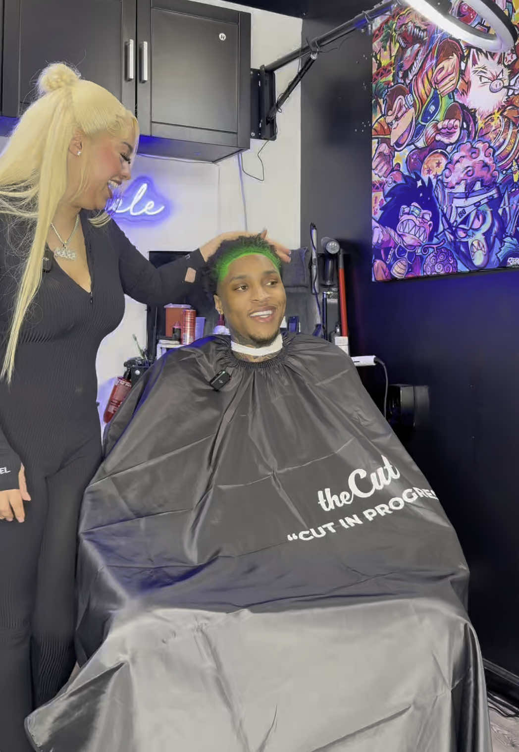 A post by @coco.shinele on TikTok caption: Harley & Joker 🧑🏾‍🎤 @Khi #cocoshinele #fyp #femalebarber #atl #couple 