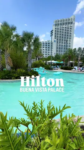 A post by @thingstodo.florida on TikTok caption: Getaway and experience the Hilton Buena Vista Palace in Orlando, Florida!  Located adjacent to Disney Springs, Hilton Buena Vista Palace is an official Walt Disney World property that offers a tropical water paradise with a lazy river, multiple bars & eateries, easy access to Disney Springs, Disney park shuttle service, and so much more! Next time you’re looking for a Disney or Orlando getaway, check out Hilton Buena Vista Palace! 🤩🏝️☀️ • • • • • #hilton #waltdisneyworld #disneysprings #orlando #centralflorida #hotel #resort #visitorlando #thingstodoinorlando 