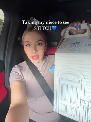 A post by @michellepaaz on TikTok caption: Surprising my niece with a gift + movie day 🥹💙 #fyp #foryoupage #foryourpage #family #niece #Stitch @Build-A-Bear 