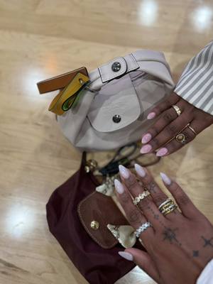 A post by @the_diaries_of_nakiah on TikTok caption: #foryou #ootdfashion #whatsinmybag #longchamp  @Longchamp 