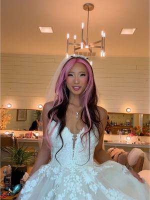 A post by @munchie.michelle on TikTok caption: We’re getting married 🩷