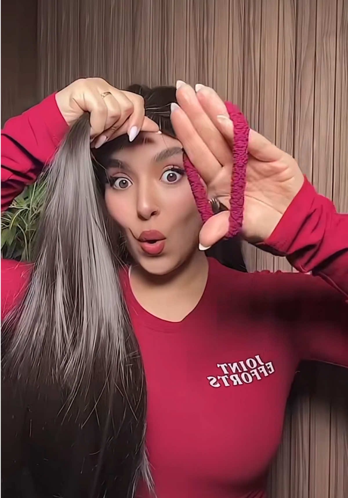 A post by @nouhailaait__ on TikTok caption: Trying the viral butterfly hair cut 