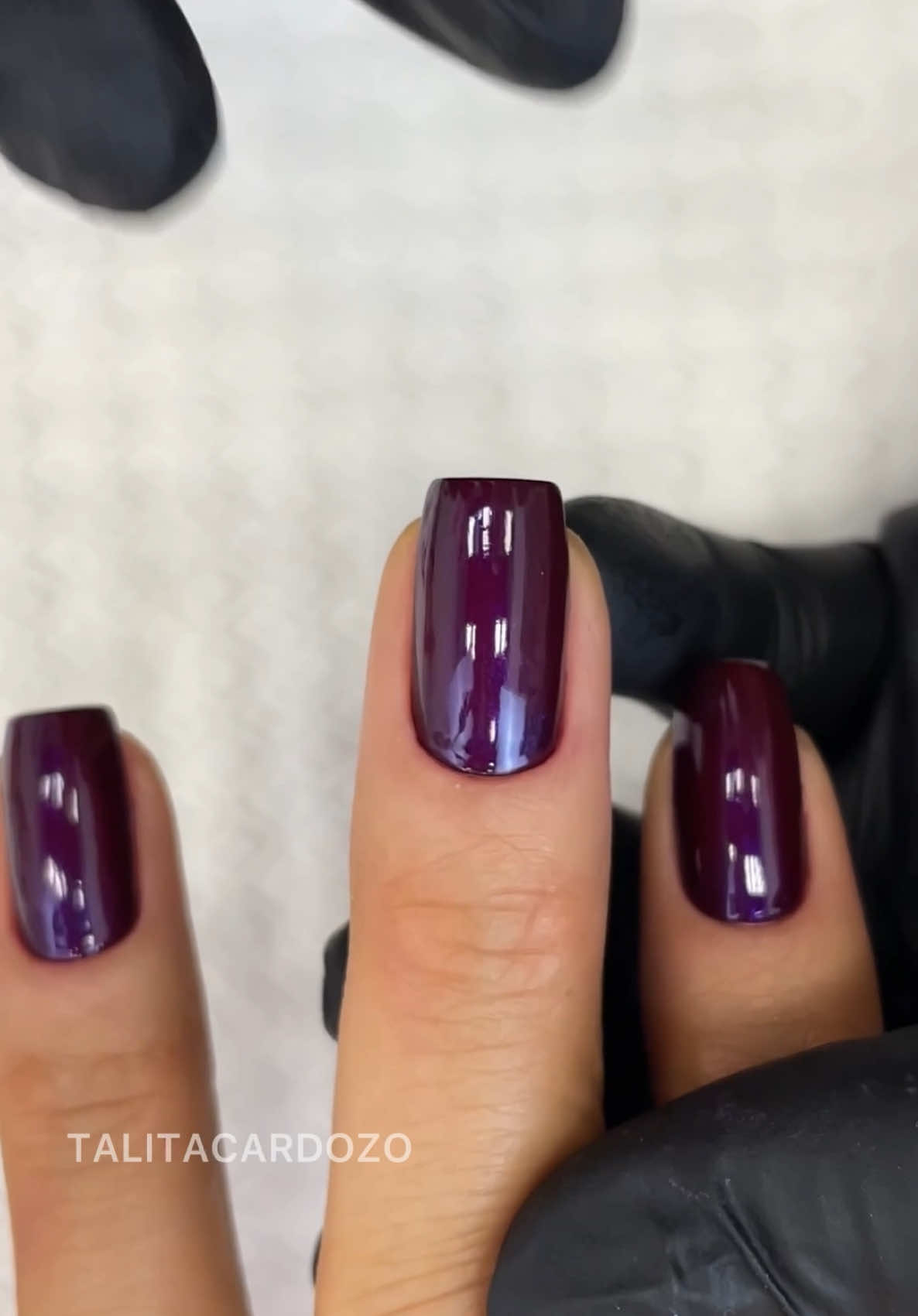 A post by @talitacardozo on TikTok caption: 😮‍💨 Esmaltes: Malbec + Marsala da @anitaesmaltes  Extra brilho roxinho também da Anita  Compre aqui 👉🏻loja.talitacardozo.com.br