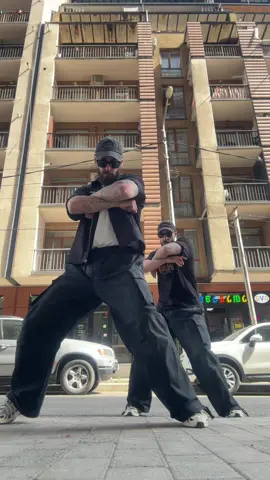 A post by @twincity on TikTok caption: Satisfying 🌊 Dc @nianaguerrero 🔥 #twins #dance #fyp #trending #foryou