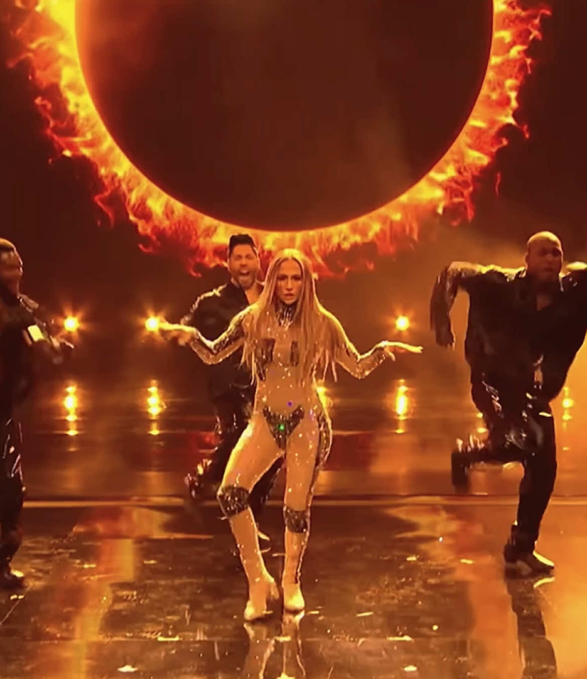 A post by @lashaa365 on TikTok caption: she is 55 dancing like the rest is due 🔥 #jlo #jenniferlopez #amas2025 #jloamas 