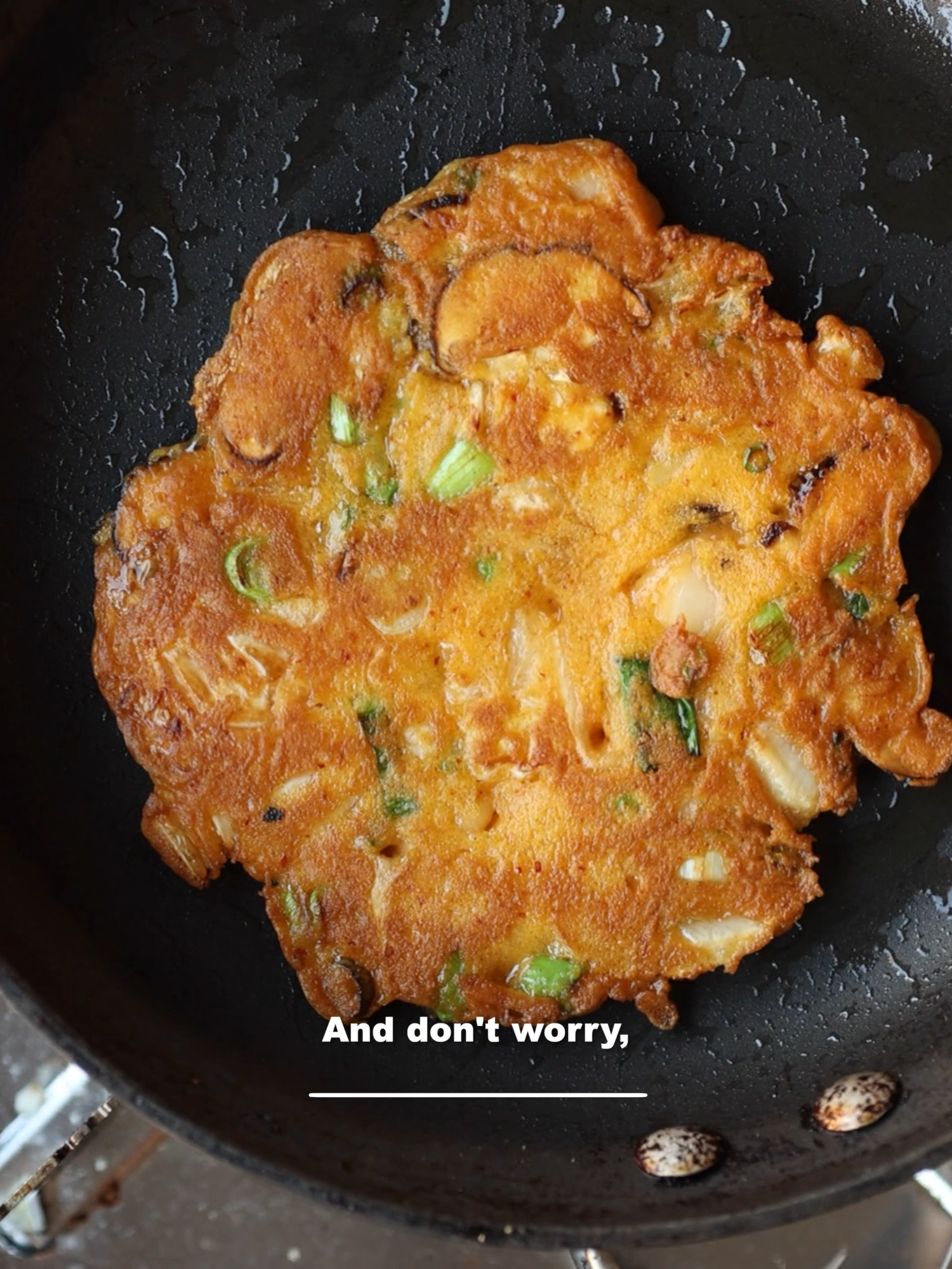 A post by @thekoreanvegan on TikTok caption: These kimchi pancakes were so good!! LIKE SO GOOD!! Also, let me know what other recipes you’d like to see from me. What is YOUR quintessential comfort food? #kimchi #kimchpancakes #koreanfood #vegan