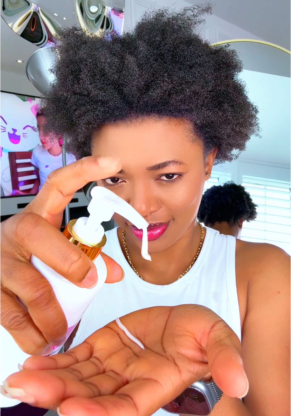 A post by @olivia_chukwu on TikTok caption: Any pr0duct that’s good for my kids hair will be good on mine too 😍 #treasurenaturals_uk #olivia_chukwu #naturalhair 